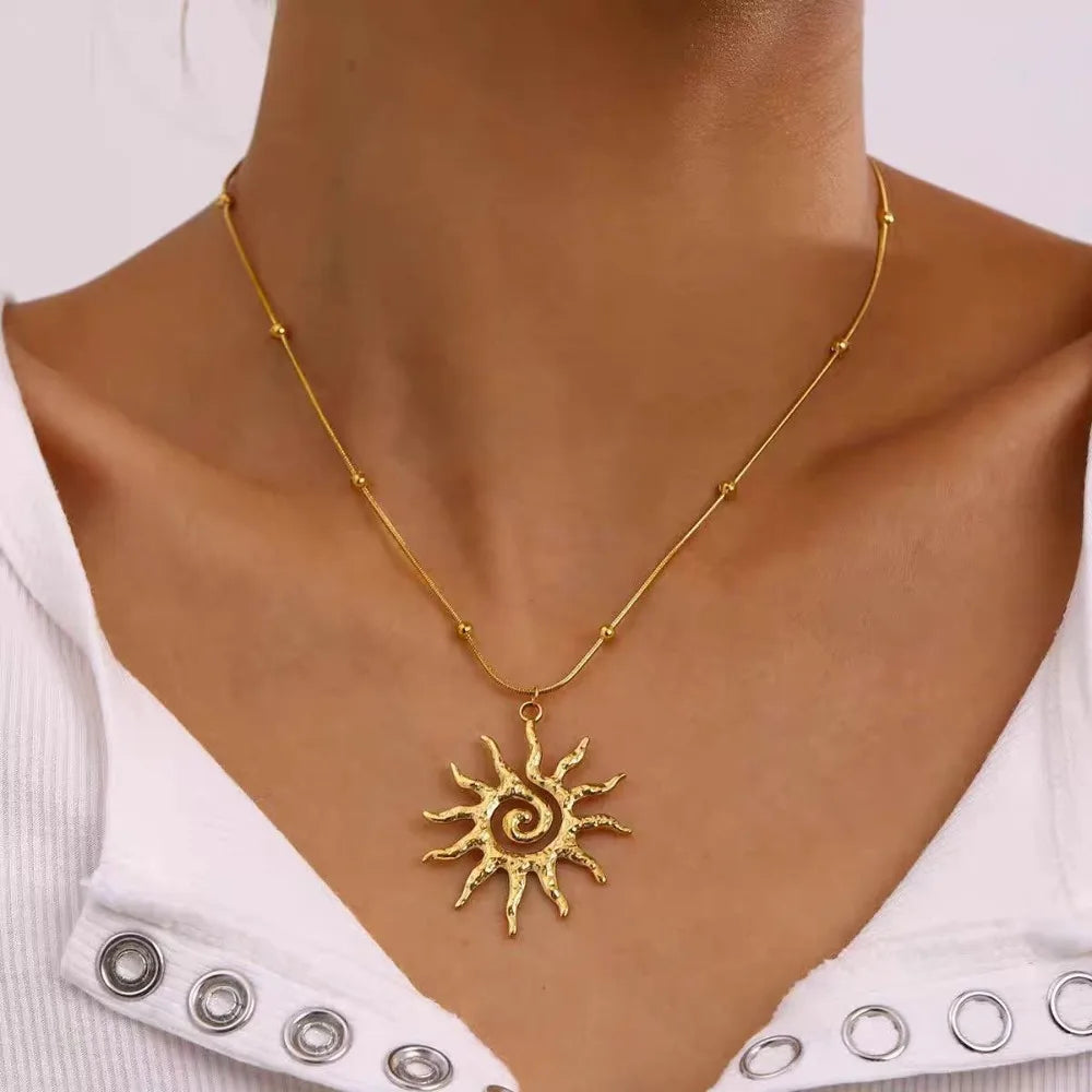 Collier pendentif en forme de soleil - ACB-PARIS