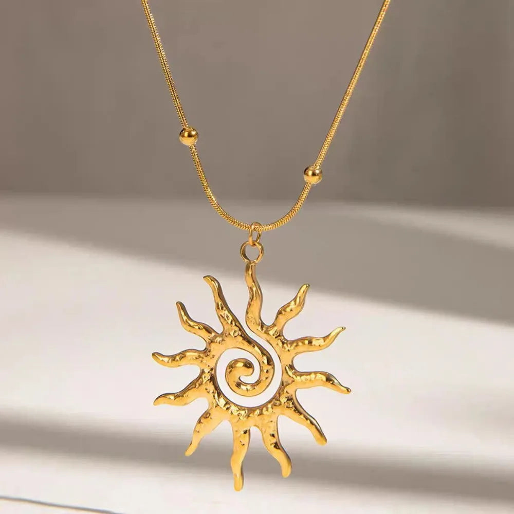 Collier pendentif en forme de soleil - ACB-PARIS